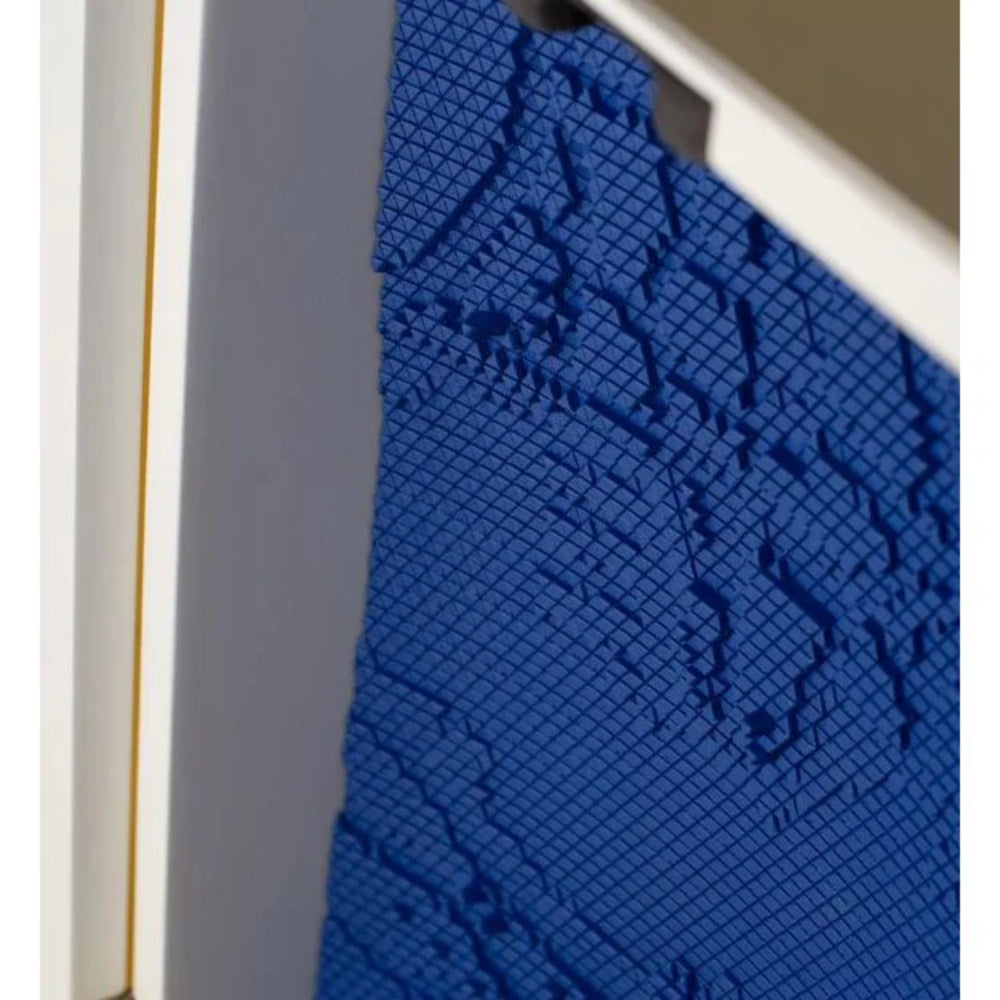 Close-up of a blue textured surface with a white border