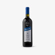 Wine bottle with blue label on a white background