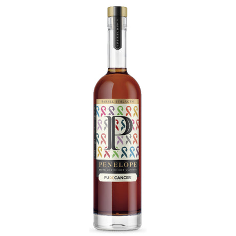 Bottle of Penelope rum with colorful label on a white background