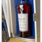 Macallan whisky bottle in a display case with 'Hong Kong' branding