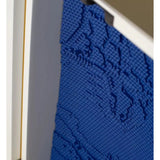 Close-up of a blue textured surface with a white border