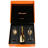 Lamborghini-branded champagne bottle and two glasses set in an orange and black box.