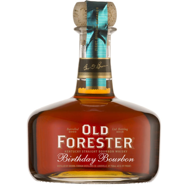 A bottle of Old Forester Birthday Bourbon – 2015 Release, featuring its signature round decanter-style design, rich amber bourbon, and a commemorative label honoring George Garvin Brown’s legacy.